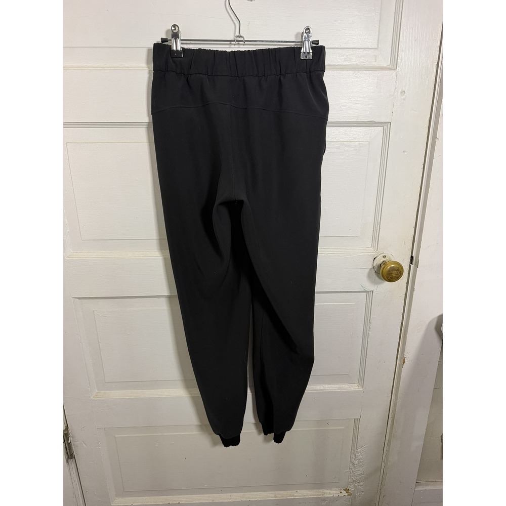 Lululemon On The Fly Jogger Black Luxtreme High Rise Pants Women 7/8 Length - Picture 3 of 4